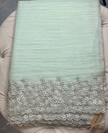 Pastel green organza saree